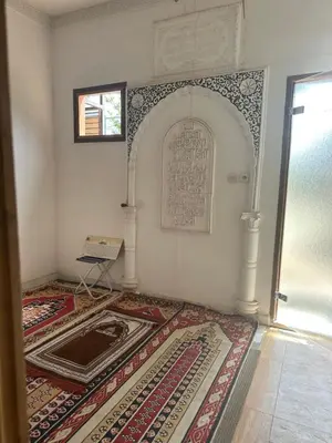 a room with a persian rug on the floor at MSC Hostel in Marrakech