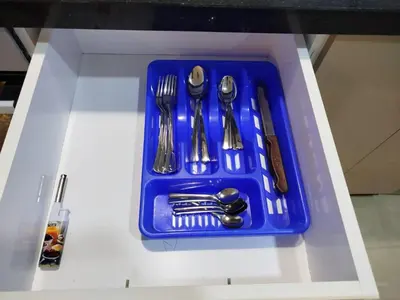 a blue tray with silver utensils on a table at Fabuleux appartement au centre ville de Marrakech à Gueliz Gare CTM et Train in Marrakech