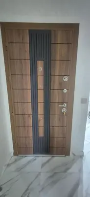 a pair of wooden doors in a room at Havre de paix en plein Marrakech in Marrakech