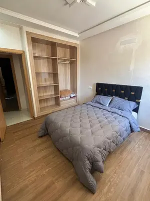 a bedroom with a large bed in a room at Villa Marrakech in Marrakech