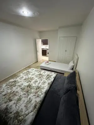 a bedroom with a bed in a room at le KABANA 37 face gare CTM Hivernage in Marrakech