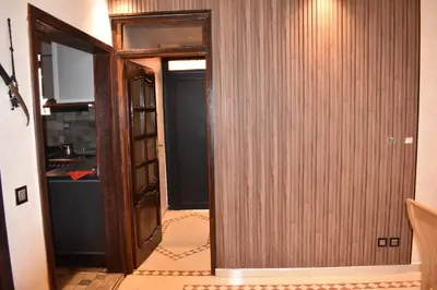 an open door to a room with a kitchen at Apartment A Zaitone G5 N3 in Marrakech