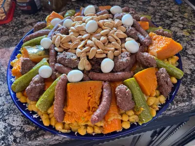 a plate of food with different types of food at Riad dar Nafaa in Marrakech