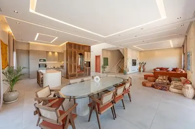 a large living room with a table and chairs at Villa Nabil by TheCasaEdition Cinema, Heated pool & Jaccuzi in Marrakech