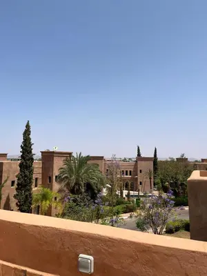a view of a college campus from a building at Villa riad raffinée privée à Marrakech in Marrakech