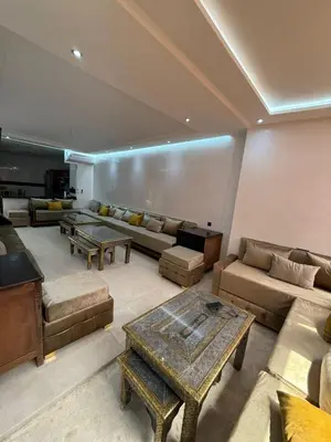 a large living room with couches and tables in it at BIG comfort with pool North Gueliz RIAD Ambiance in Marrakech