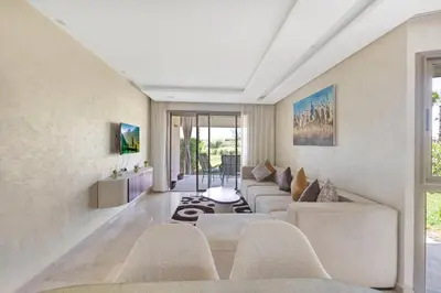 a living room with a couch and chairs at Nice apartment in Marrakesh in Marrakech