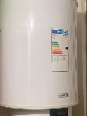 a white refrigerator with a thermometer on the side of it at Moroccorent in Marrakech