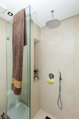 a bathroom with a shower with a glass door at Elegance and Comfort in Marrakesh in Marrakech