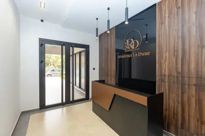 a lobby with a entrance to a building with a sign at Elegance and Comfort in Marrakesh in Marrakech