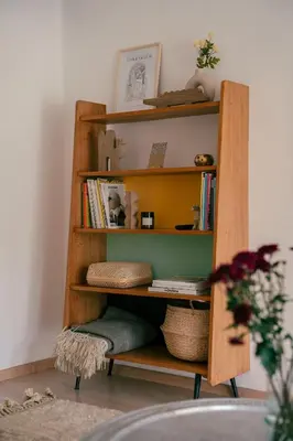a book shelf with books on it in a room at Cozy apartment Marrakech hivernage with nice terrace in Marrakech