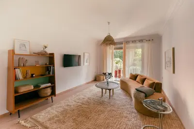 a living room with a couch and a table at Cozy apartment Marrakech hivernage with nice terrace in Marrakech