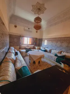 a large living room with couches and a table at amazing home and amazing rooftop in Marrakech