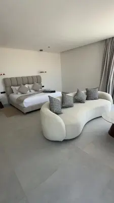 a living room with two beds and a couch at Villa Selma in Marrakech