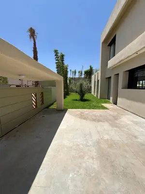 an empty driveway leading to a house at Villa Selma in Marrakech