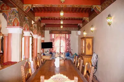 a conference room with a long table and chairs at Riad-style villa with a private pool in Marrakech
