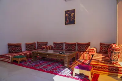a living room with couches and a table at Marrakesh villa 1 in Marrakech
