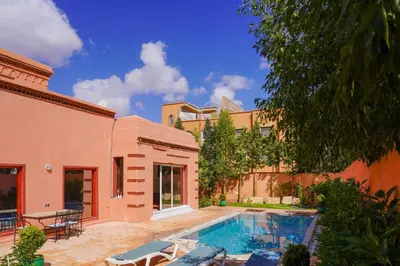 a pool in the backyard of a house at Marrakesh villa 1 in Marrakech
