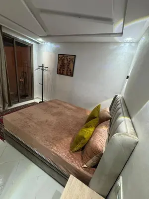 a bed in a room with at Apartment in Marrakech in Marrakech