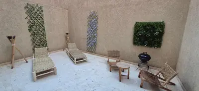 a rendering of a room with chairs and a table at Sérénité en plein Marrakech in Marrakech