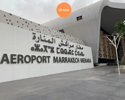 a building with a sign for aazport marriott namespace at The Modern Luxury - Marrakech in Marrakech