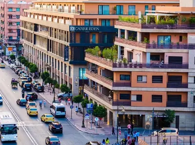 a view of a city street with cars and buildings at Apartment piscine gueliz hivernage ctm train aeroport supratour in Marrakech