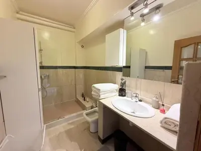 a bathroom with a sink and a shower at Lux apartment With a Sunset View in Marrakech