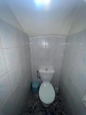 a small bathroom with a white toilet in it at Riad& 4 Chambres Avec La piscine in Marrakech