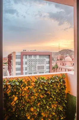 a view of a building from a balcony at Apartment in Center of Marrakech in Marrakech
