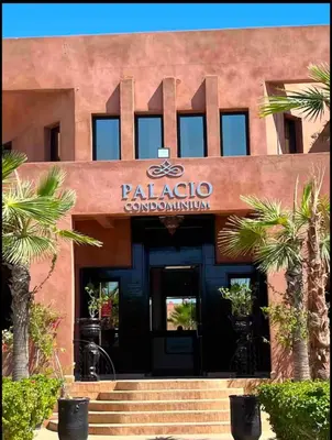 a building with a sign that reads palapa communication at Superbe appartement Marrakech Piscine Wifi Climatisation in Marrakech