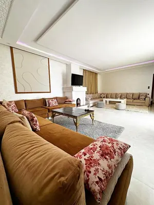a living room with a couch and a table at Marrakech Escape Your Private Villa in Marrakech