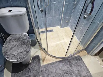 a bathroom with a shower and a toilet at Residencia Salma in Marrakech