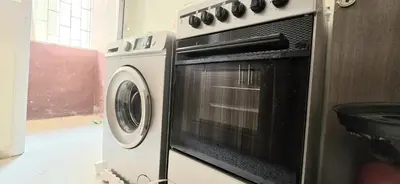 a washer and dryer in a kitchen at Nice apart well located 2 Rooms -Only Family in Marrakech