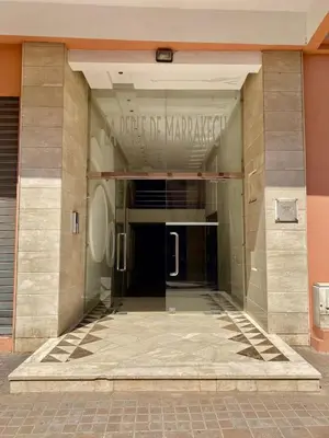 a building with the entrance to the hermit margaritaville building at Very comfortable apartment in a perfect location in Marrakech