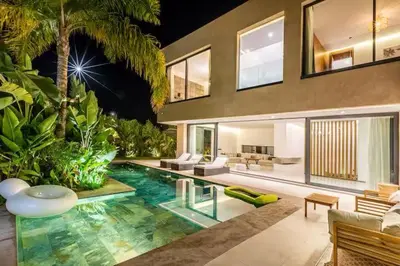 a house with a swimming pool in front of it at Villa marrakech in Marrakech