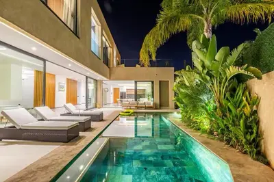 a living room with a swimming pool in a house at Villa marrakech in Marrakech