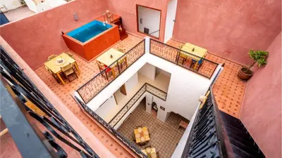an overhead view of a house with a swimming pool at Riad L'EncensOriental & Spa in Marrakech