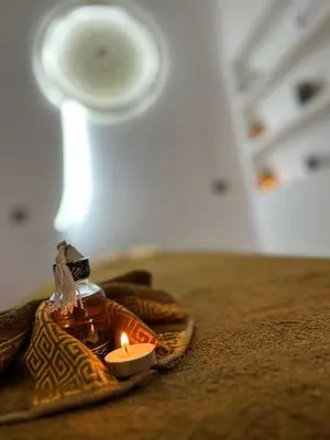 a candle sitting on top of a table at Riad L'EncensOriental & Spa in Marrakech