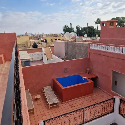 a hot tub on the roof of a building at Riad L'EncensOriental & Spa in Marrakech