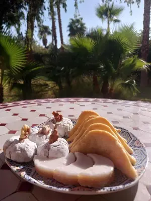 a plate of food sitting on a table at Villa Marrakchia - Palais d'hôtes in Marrakech