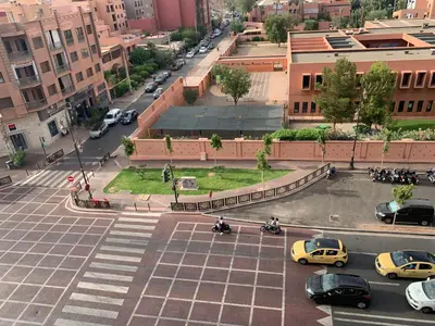 an aerial view of a city street with cars at Appartement Gueliz in Marrakech