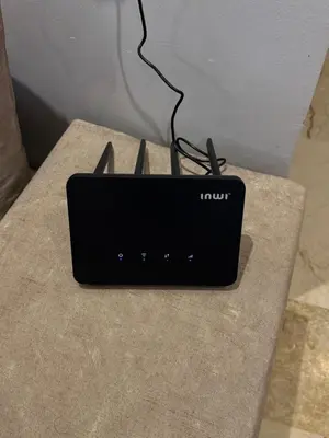 a black laptop sitting on top of a table at Elegant Apartment Hivernage in Marrakech