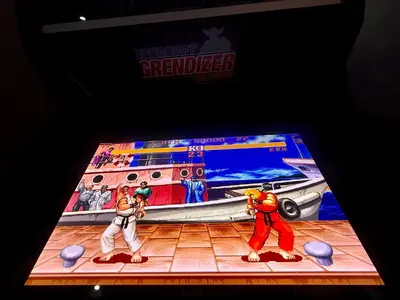 a stage with two fighters in a boxing game at Maison H&A in Marrakech