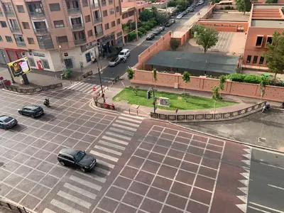 an aerial view of a street with cars on the street at Appartement Marrakechi in Marrakech
