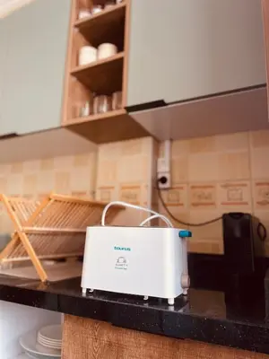 a toaster sitting on a counter in a kitchen at Bright Place and High Quality Mattress in Marrakech