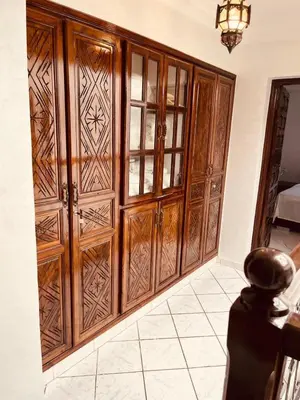 a large wooden door in a room at 3 bedroom duplex with swimming pool in Marrakech
