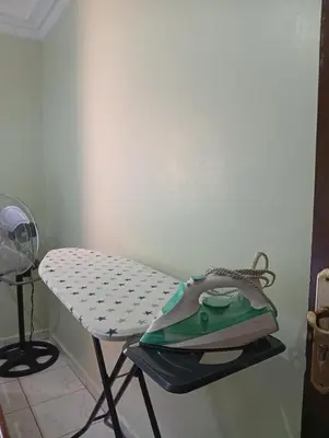 a purse sitting on a table in a room at appartement Airport Guests Marrakech in Marrakech