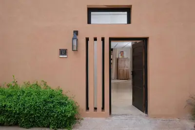 an open door to a room with a hallway at Riad Beldi Chic Golf Al Maaden in Marrakech