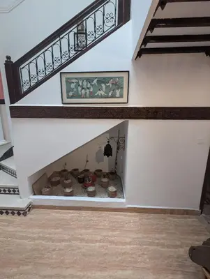 a set of stairs with a shelf in the floor at riad rabiaa in Marrakech