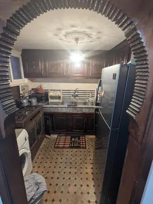 an overhead view of a kitchen with a refrigerator at riad rabiaa in Marrakech
